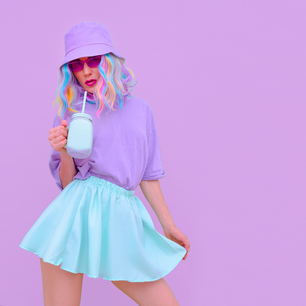 A Female Model Wearing a Pastel Summer Theme Outfit